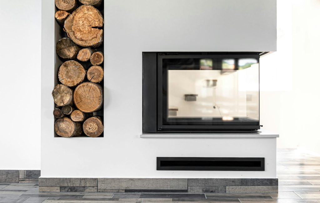 Modern home fireplace in the interior of the house.